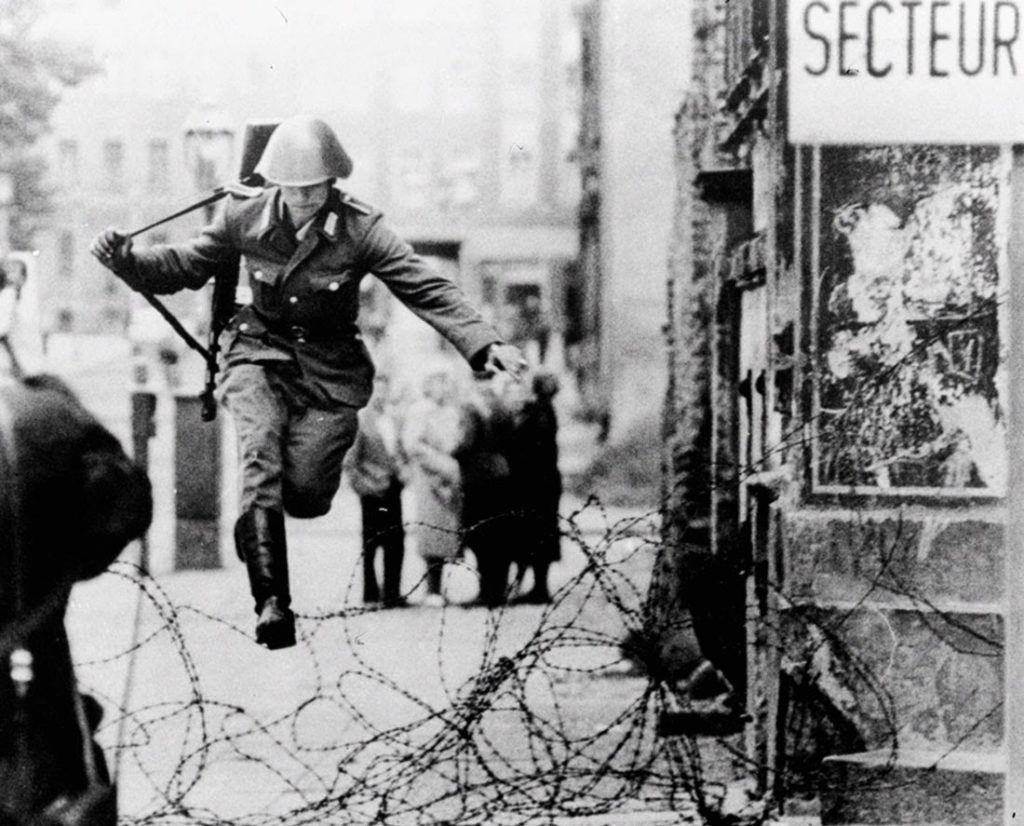 Jumping The Berlin Wall Iconic Historical Photos